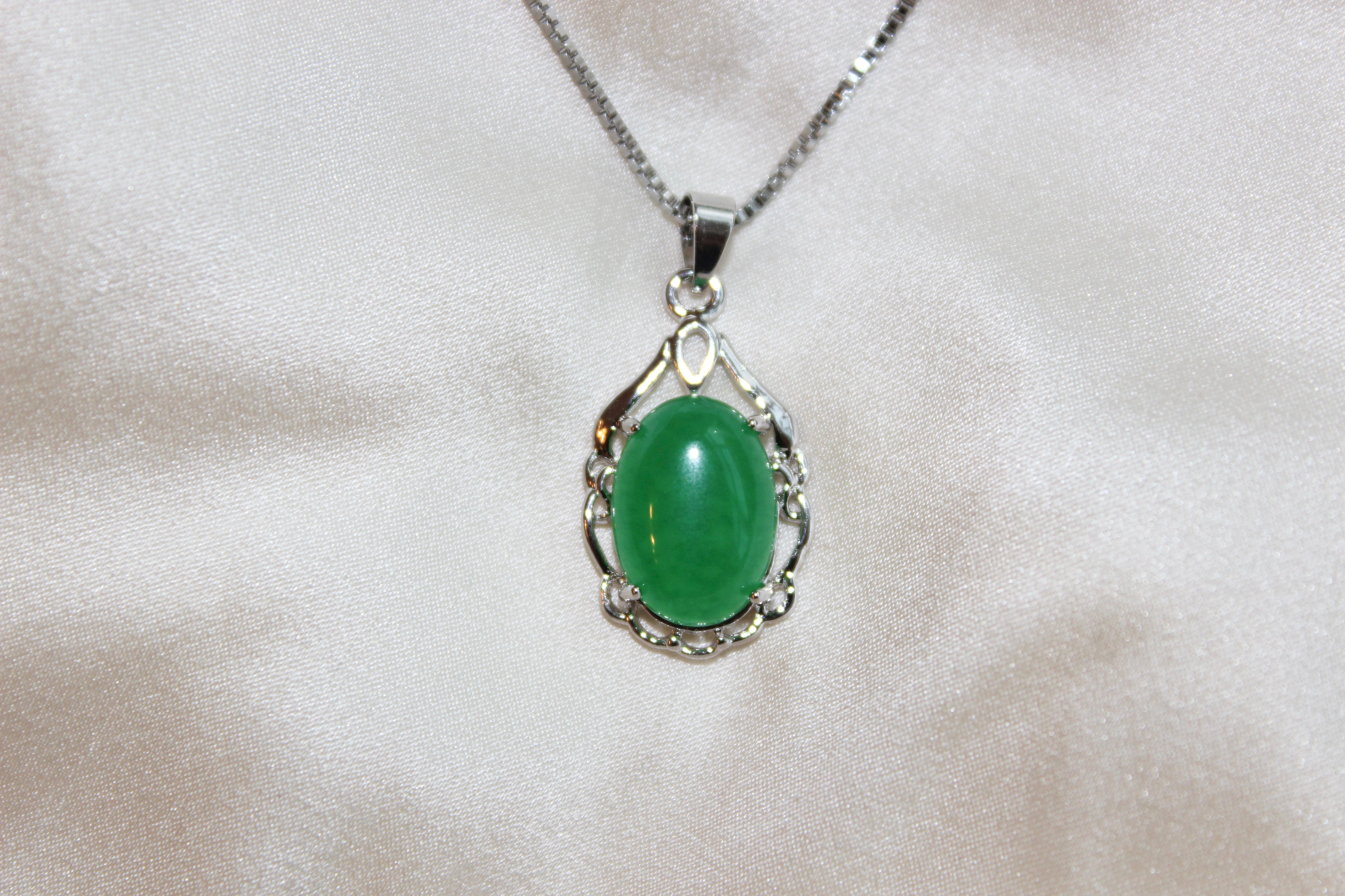 Silver Framed Oval Shape Jade Pendant Necklace