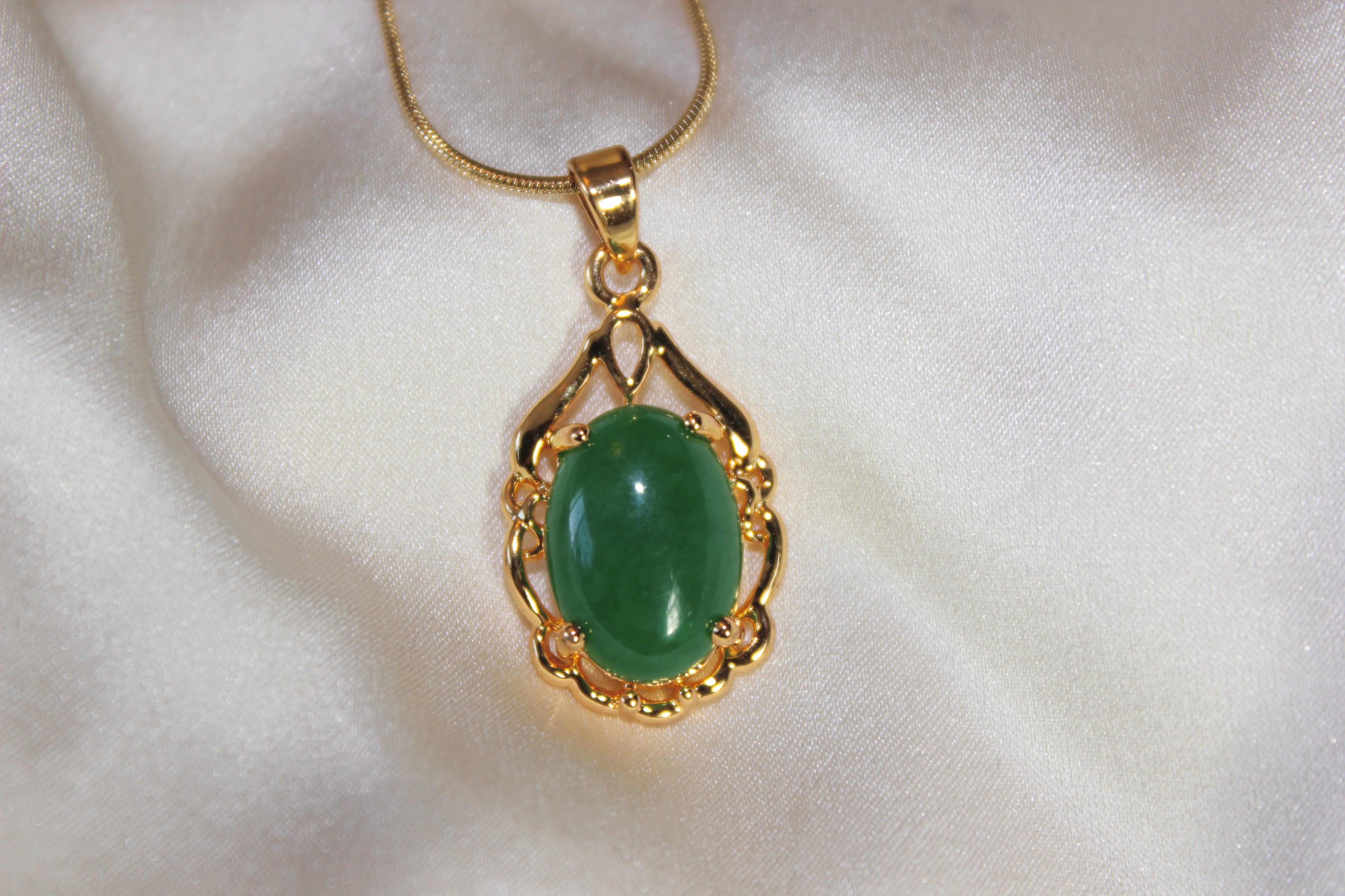 Gold Framed Oval Shape Jade Pendant Necklace