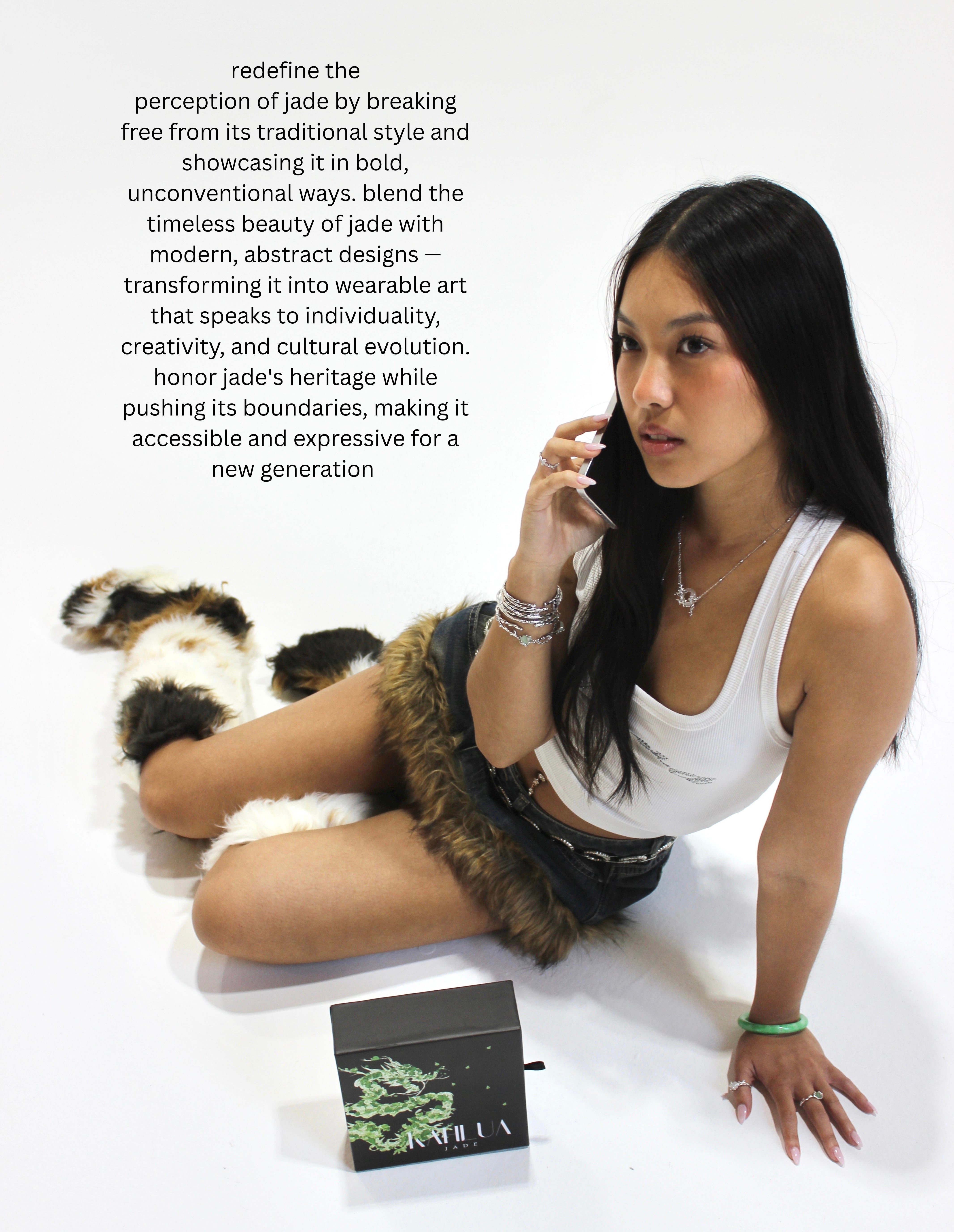 redefine_the_perception_of_jade_by_breaking_free_from_its_traditional_style_and_showcasing_it_in_bold_unconventional_ways._blend_the_timeless_beauty_of_jade_with_modern_abstract_desig.jpg